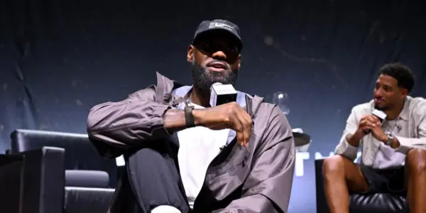 LeBron, still mum on decision, riles up fans with 76ers mantra